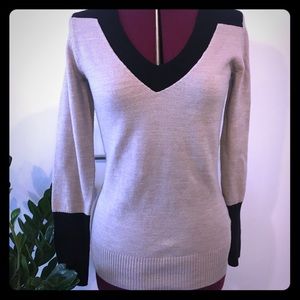 Cream sweater with black accents